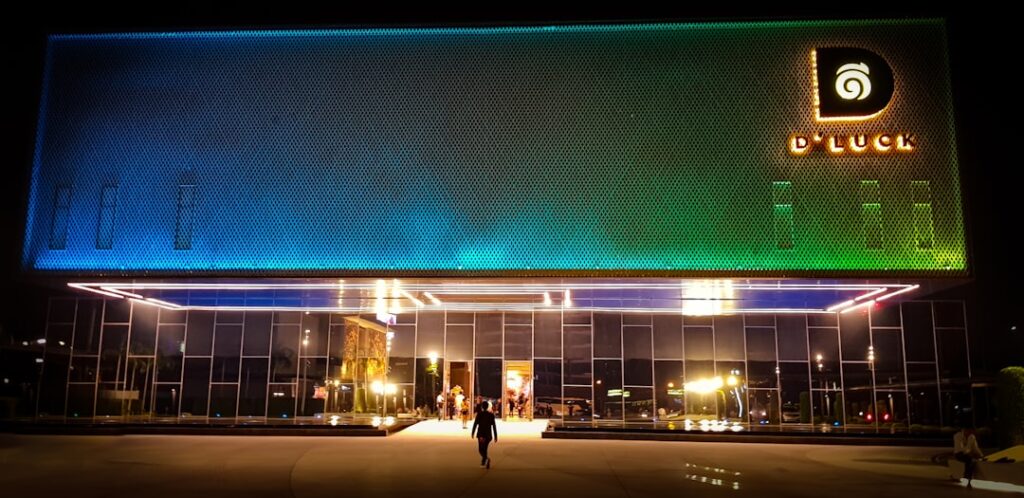 new boutique hotel exterior night Europe 2025