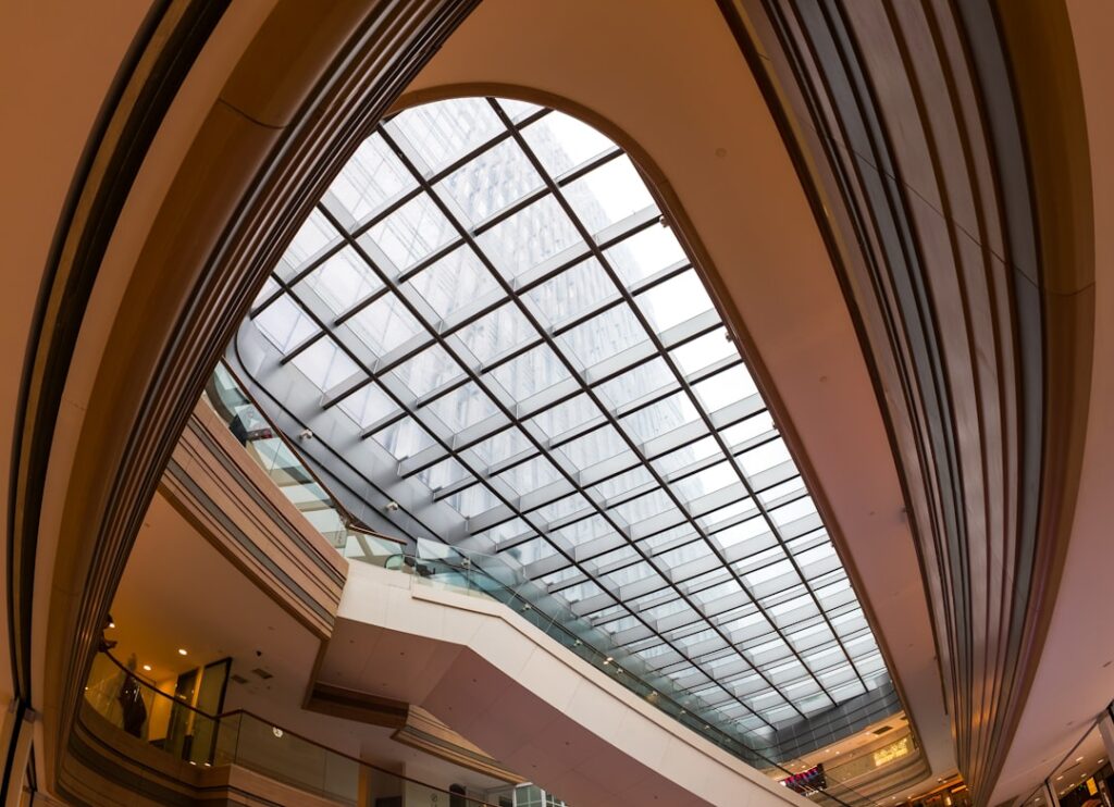 luxury heritage hotel lobby glass roof Brussels