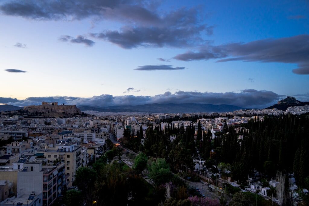 Athens skyline luxury hotel rooftop pool Acropolis view