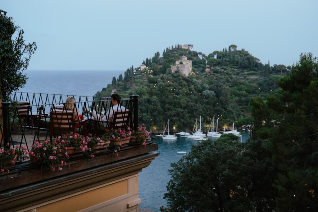 boutique hotel terrace Europe guests dining sunset