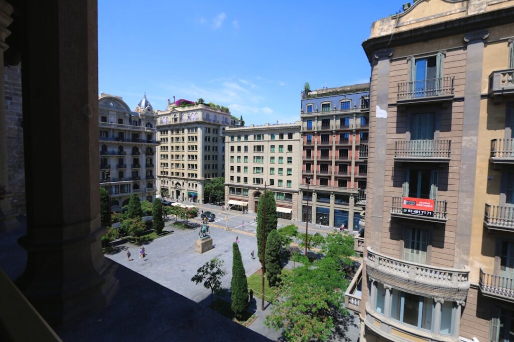 traveler enjoying luxury hotel balcony view European city