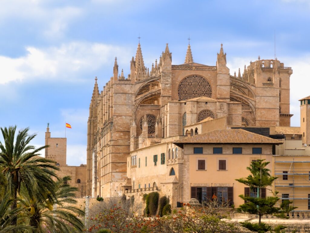 Palma de Mallorca Cathedral La Seu and waterfront sunrise aerial